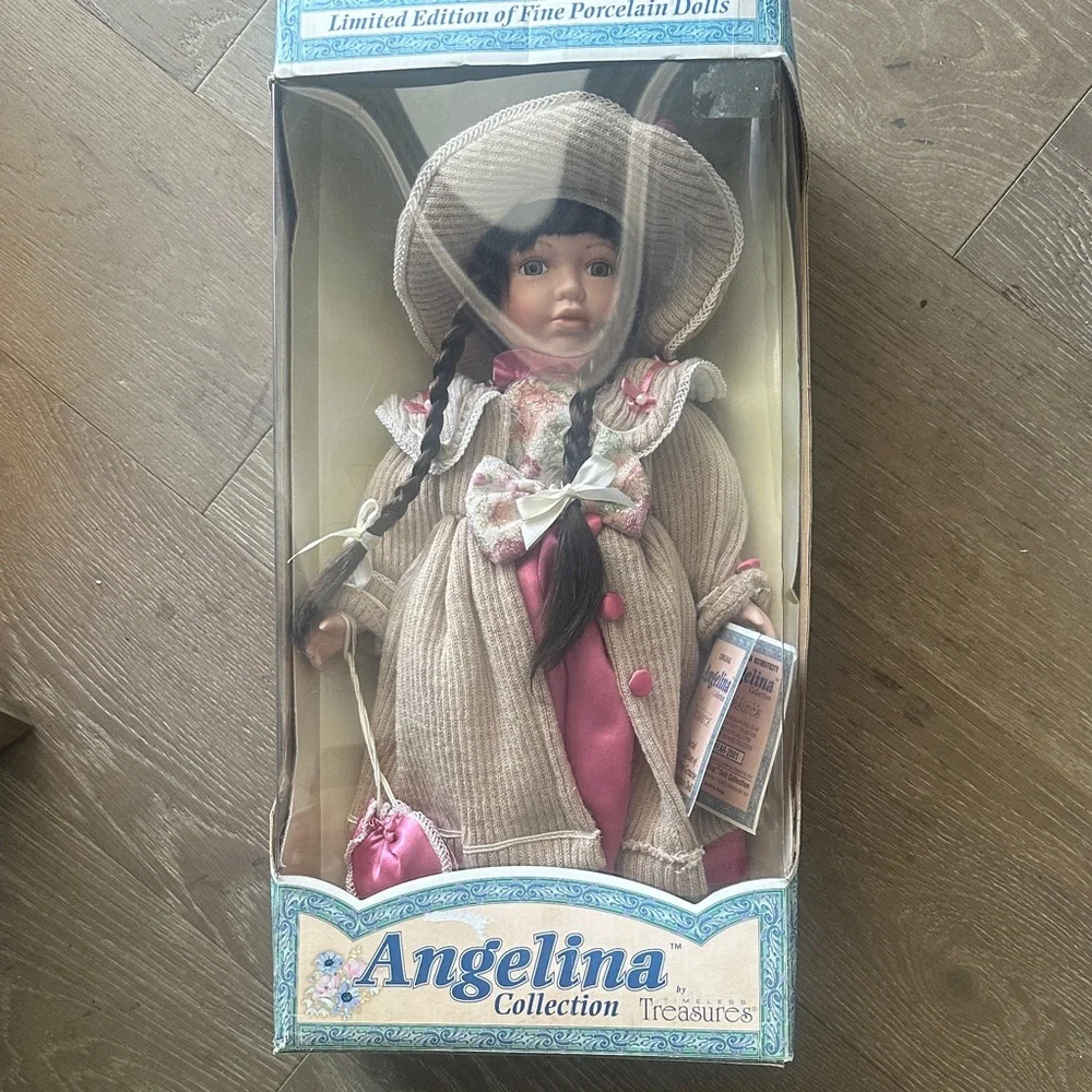 2001 Porcelain Doll with Pink Dress and Tan Coat